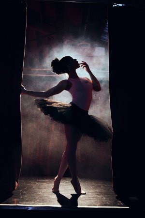Kira Noir sultry burlesque performance ignites wild passion, as she dives into a thrilling blowjob photo 1