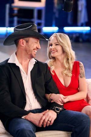 Carina Blair rides Johnny hard, her tattooed skin glistening as she takes control photo 8
